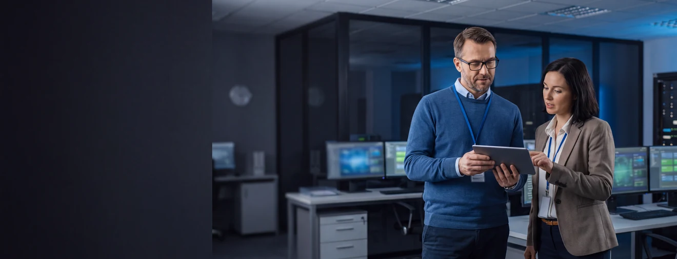 Enterprise IT leaders reviewing mobile operations on a tablet
